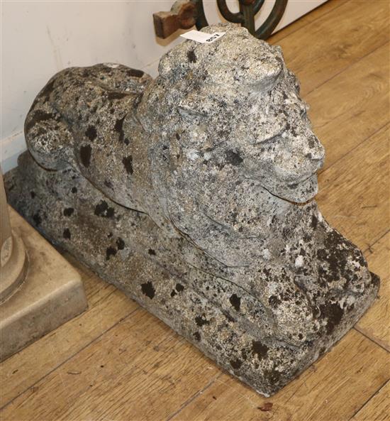 A reconstituted stone lion garden ornament L.62cm